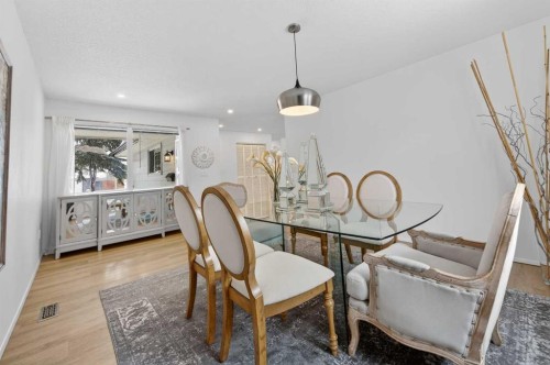 60 Sunmount Close Se, Calgary, AB - Indoor Photo Showing Dining Room