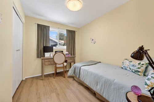 60 Sunmount Close Se, Calgary, AB - Indoor Photo Showing Bedroom