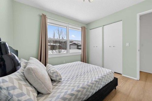 60 Sunmount Close Se, Calgary, AB - Indoor Photo Showing Bedroom