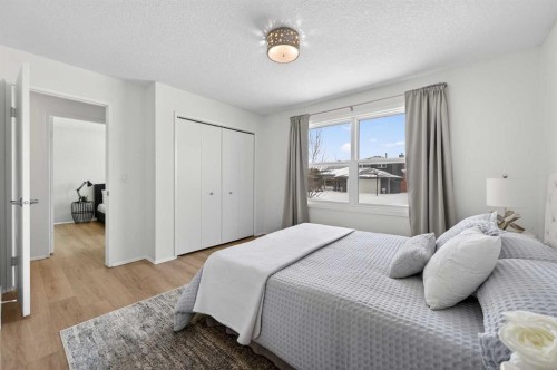60 Sunmount Close Se, Calgary, AB - Indoor Photo Showing Bedroom