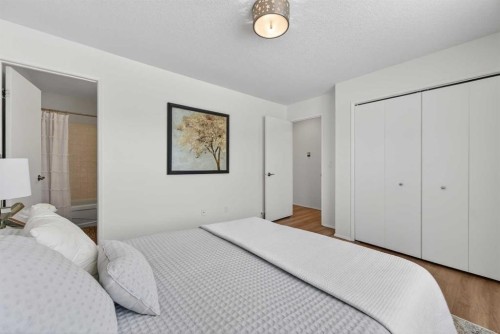 60 Sunmount Close Se, Calgary, AB - Indoor Photo Showing Bedroom