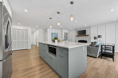 60 Sunmount Close Se, Calgary, AB - Indoor Photo Showing Kitchen With Upgraded Kitchen