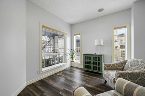169 Panamount Green Nw, Calgary, AB - Indoor Photo Showing Living Room