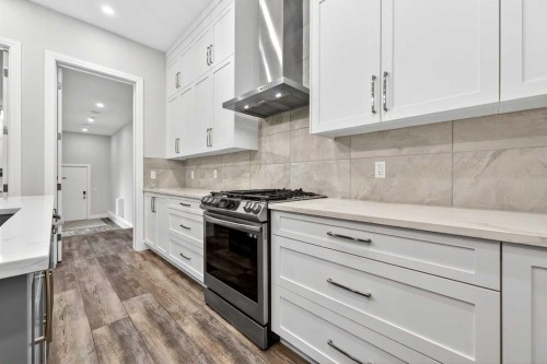 95 Rock Lake View Nw, Calgary, AB - Indoor Photo Showing Kitchen With Upgraded Kitchen