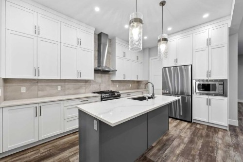 95 Rock Lake View Nw, Calgary, AB - Indoor Photo Showing Kitchen With Stainless Steel Kitchen With Upgraded Kitchen