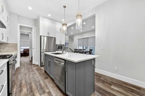 95 Rock Lake View Nw, Calgary, AB - Indoor Photo Showing Kitchen With Stainless Steel Kitchen With Upgraded Kitchen