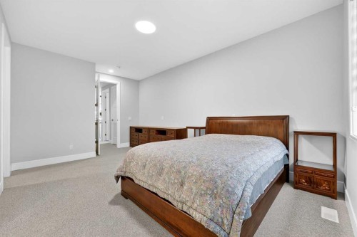 95 Rock Lake View Nw, Calgary, AB - Indoor Photo Showing Bedroom