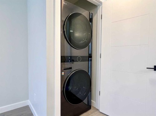 95 Rock Lake View Nw, Calgary, AB - Indoor Photo Showing Laundry Room
