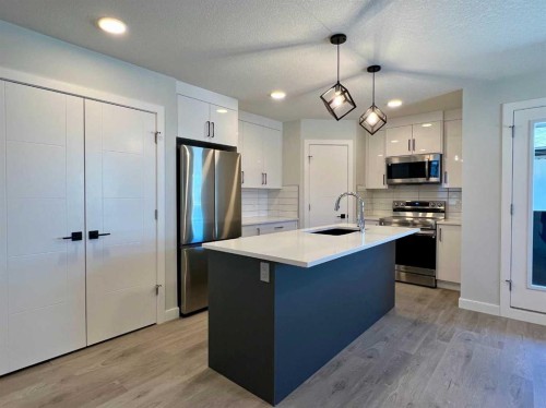 95 Rock Lake View Nw, Calgary, AB - Indoor Photo Showing Kitchen With Stainless Steel Kitchen With Upgraded Kitchen