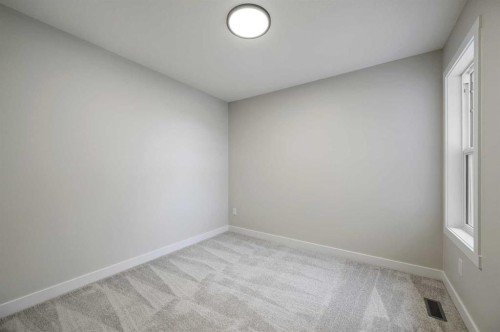 86 Versant Rise Sw, Calgary, AB - Indoor Photo Showing Other Room