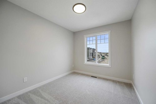 86 Versant Rise Sw, Calgary, AB - Indoor Photo Showing Other Room