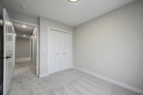 86 Versant Rise Sw, Calgary, AB - Indoor Photo Showing Other Room