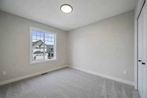 86 Versant Rise Sw, Calgary, AB - Indoor Photo Showing Other Room