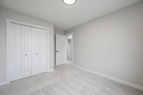 86 Versant Rise Sw, Calgary, AB - Indoor Photo Showing Other Room