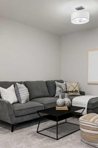 86 Versant Rise Sw, Calgary, AB - Indoor Photo Showing Living Room