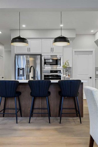 86 Versant Rise Sw, Calgary, AB - Indoor Photo Showing Kitchen With Stainless Steel Kitchen