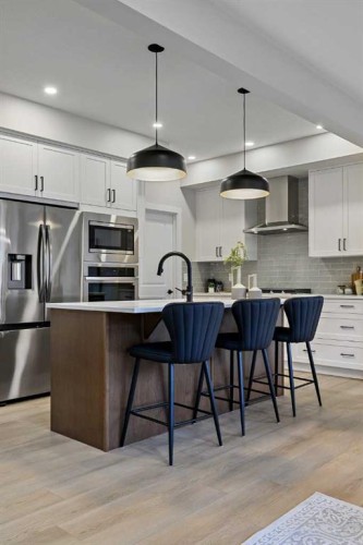 86 Versant Rise Sw, Calgary, AB - Indoor Photo Showing Kitchen With Stainless Steel Kitchen With Upgraded Kitchen