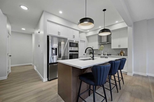 86 Versant Rise Sw, Calgary, AB - Indoor Photo Showing Kitchen With Stainless Steel Kitchen With Upgraded Kitchen