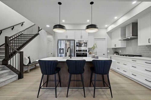 86 Versant Rise Sw, Calgary, AB - Indoor Photo Showing Kitchen With Stainless Steel Kitchen With Upgraded Kitchen