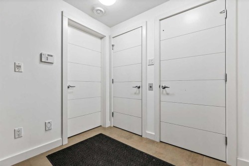 606 Aspen Meadows Hill Sw, Calgary, AB - Indoor Photo Showing Bedroom