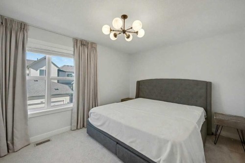 123 Treeline View Sw, Calgary, AB - Indoor Photo Showing Bedroom