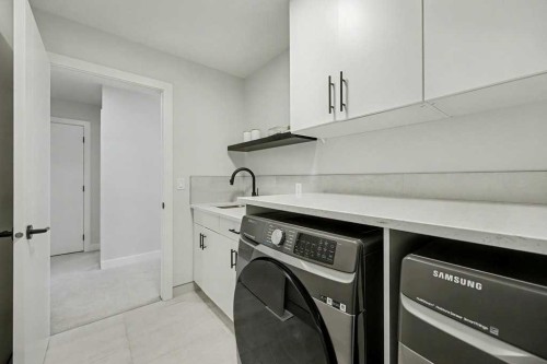 123 Treeline View Sw, Calgary, AB - Indoor Photo Showing Laundry Room