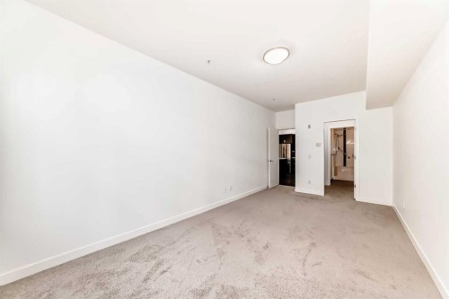 109-22 Auburn Bay Link Se, Calgary, AB - Indoor Photo Showing Other Room