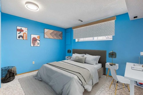 23 Dovercliffe Way Se, Calgary, AB - Indoor Photo Showing Bedroom