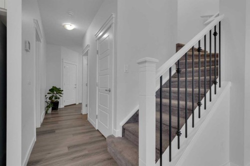 #208 Dawson Harbour Heights, Chestermere, AB - Indoor Photo Showing Other Room