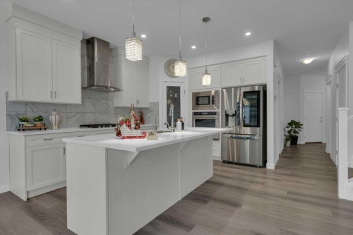 #208 Dawson Harbour Heights, Chestermere, AB - Indoor Photo Showing Kitchen With Upgraded Kitchen