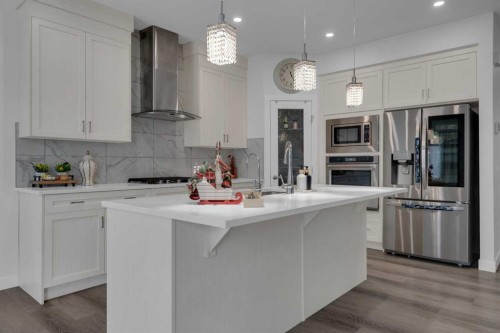 #208 Dawson Harbour Heights, Chestermere, AB - Indoor Photo Showing Kitchen With Upgraded Kitchen
