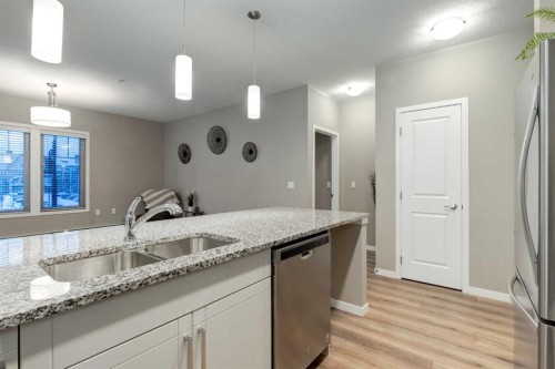 316-30 Mahogany Mews Se, Calgary, AB - Indoor Photo Showing Kitchen With Double Sink