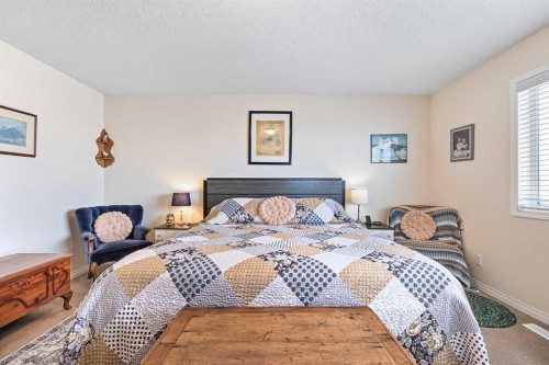 436 Cimarron Boulevard, Okotoks, AB - Indoor Photo Showing Bedroom