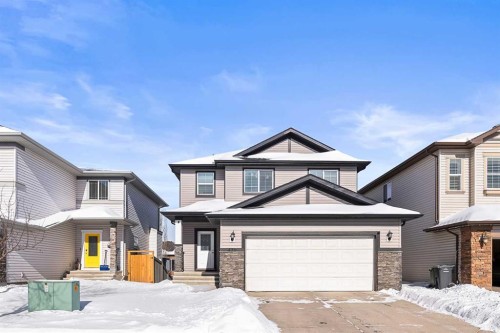 436 Cimarron Boulevard, Okotoks, AB - Outdoor With Facade