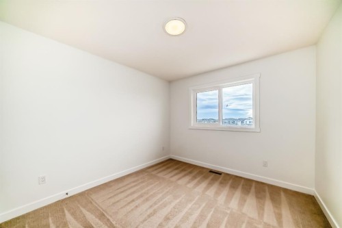 63-145 Cheslea Mews, Chestermere, AB - Indoor Photo Showing Other Room