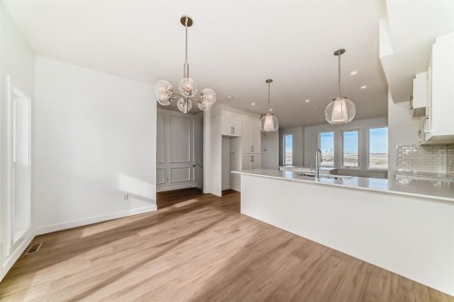 63-145 Cheslea Mews, Chestermere, AB - Indoor Photo Showing Kitchen With Upgraded Kitchen