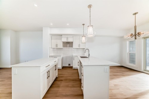 63-145 Cheslea Mews, Chestermere, AB - Indoor Photo Showing Kitchen With Upgraded Kitchen
