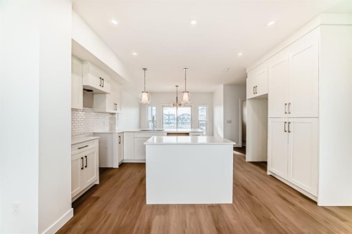 63-145 Cheslea Mews, Chestermere, AB - Indoor Photo Showing Kitchen With Upgraded Kitchen
