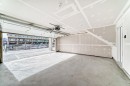 63-145 Cheslea Mews, Chestermere, AB  - Indoor Photo Showing Garage 