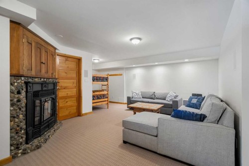 1021 Rundleview Drive, Canmore, AB - Indoor With Fireplace