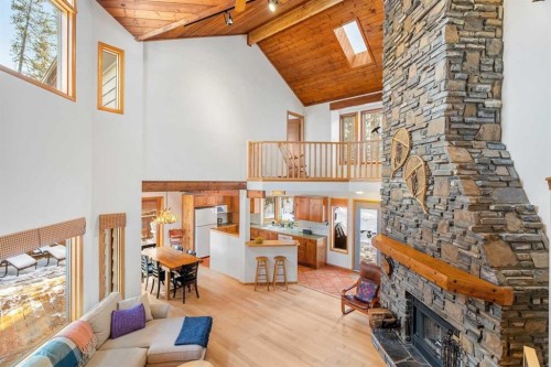 1021 Rundleview Drive, Canmore, AB - Indoor Photo Showing Living Room With Fireplace