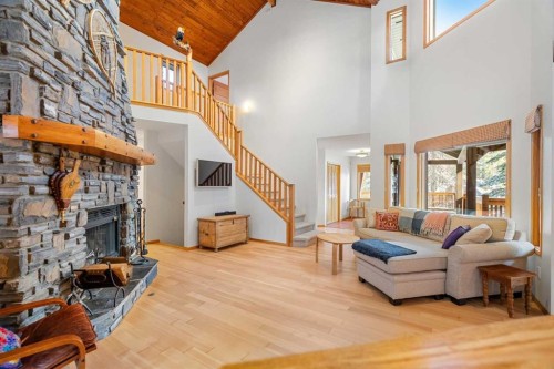 1021 Rundleview Drive, Canmore, AB - Indoor Photo Showing Living Room With Fireplace