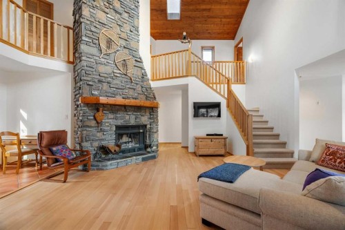 1021 Rundleview Drive, Canmore, AB - Indoor Photo Showing Living Room With Fireplace