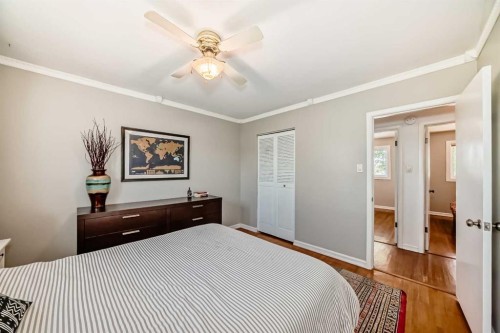 91 Chisholm Crescent Nw, Calgary, AB - Indoor Photo Showing Bedroom