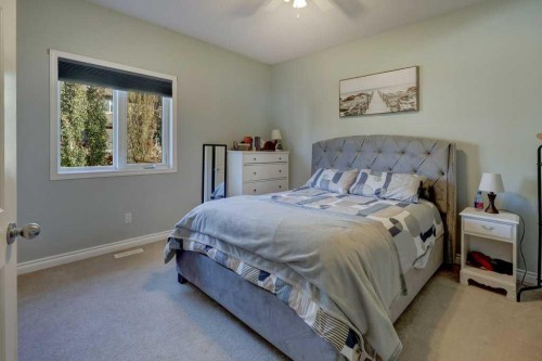 1310 23 Avenue, Didsbury, AB - Indoor Photo Showing Bedroom