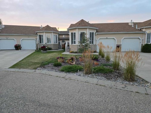 1310 23 Avenue, Didsbury, AB - Outdoor With Facade