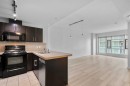 1804-210 15 Avenue Se, Calgary, AB  - Indoor Photo Showing Kitchen With Double Sink 