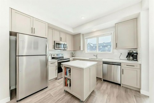 36 Carringvue Way Nw, Calgary, AB - Indoor Photo Showing Kitchen With Stainless Steel Kitchen With Upgraded Kitchen