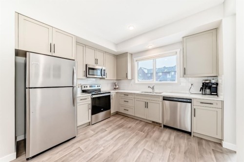36 Carringvue Way Nw, Calgary, AB - Indoor Photo Showing Kitchen With Stainless Steel Kitchen With Upgraded Kitchen