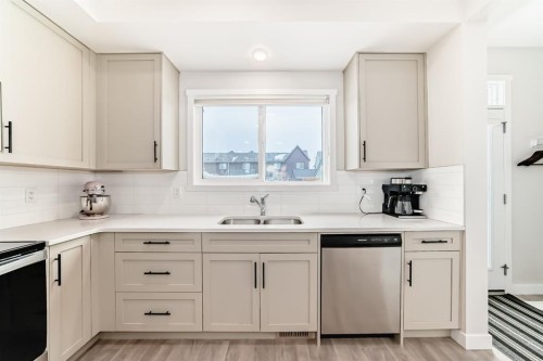 36 Carringvue Way Nw, Calgary, AB - Indoor Photo Showing Kitchen With Stainless Steel Kitchen With Double Sink With Upgraded Kitchen